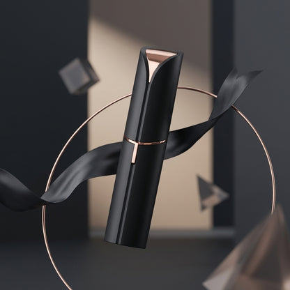 Black and rose gold lipstick with black ribbons on a dark background